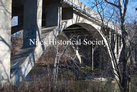 The images below show the Niles-McDonald Bridge as it appeared in 2011 and the damage to the understructure that caused the be closed to all traffic.