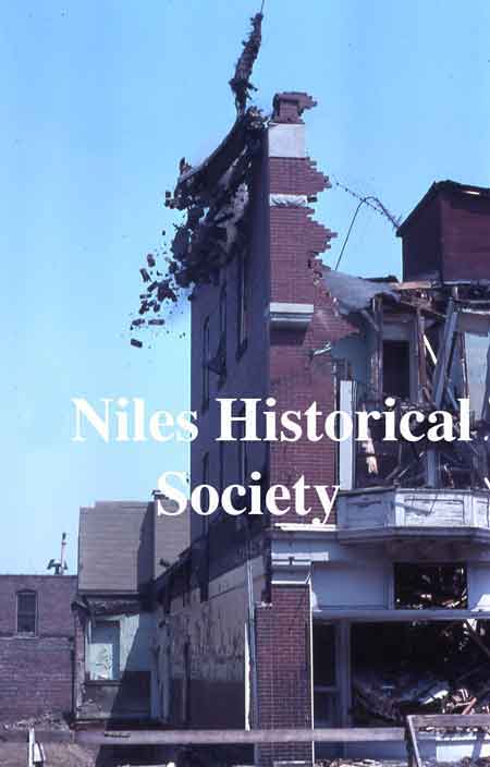 Photographs showing the demolition of the Allison Building in 1976 during urban renewal.