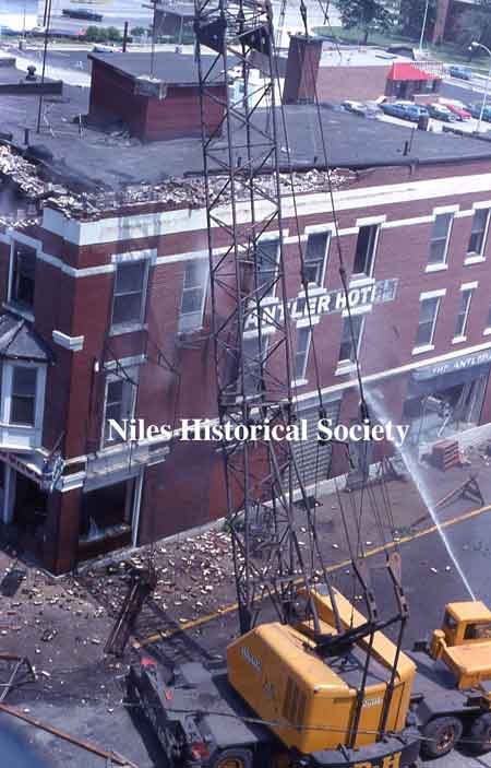 Photographs showing the demolition of the Allison Building in 1976 during urban renewal.