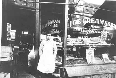 1900 photo taken of Milo Caramella standing in front of his store located at 13 South Main Street in downtown Niles