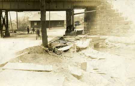 Taken about 1914, this photograph shows the Erie Railroad overpass at Robbins Avenue as it winds into Church Street.