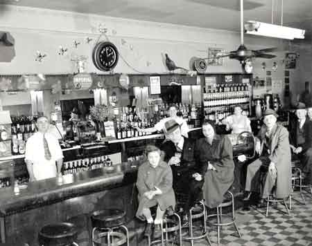 Interior of the McKinley Restaurant showing the bar area. Notice the child sitting in the bar.