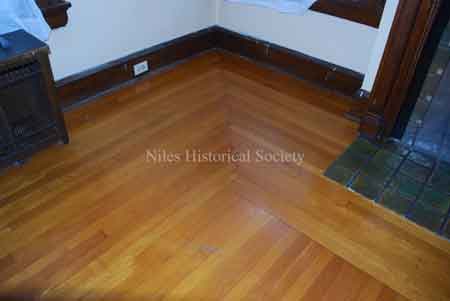 Detail of oak flooring showing corner pattern.