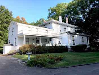 View the main house, garage,