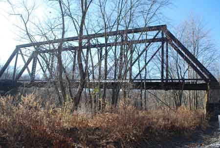Photographs taken in 2011 of the iron bridge over the Mahoning River. This historic bridge was incorporated into part of the Niles Bike Trail.