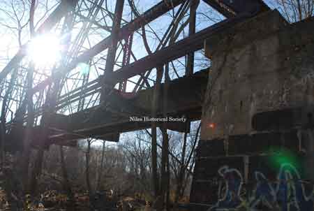 Photographs taken in 2011 of the iron bridge over the Mahoning River. This historic bridge was incorporated into part of the Niles Bike Trail.