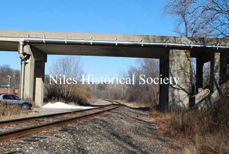 The images below show the Niles-McDonald Bridge as it appeared in 2011 and the damage to the understructure that caused the be closed to all traffic.