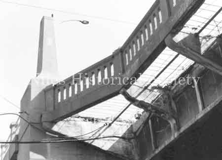 Picture taken during the 1981 renovation of the Main Street Viaduct. At that time, the 1933 paving bricks were removed and replaced with concrete. Sidewalks were demolished and repairs made to the substructure.