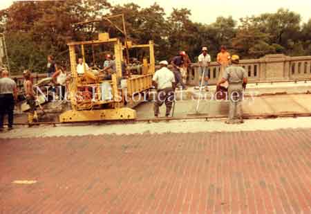 Photo showing the destruction and rebuilding of the Niles Viaduct connecting the south side of the city to the downtown area. 2002