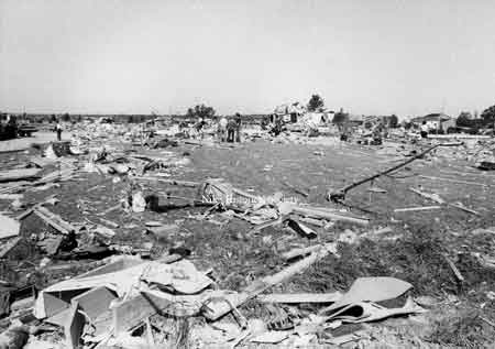 A series of photographs showing in graphic detail, the aftermath of the tornado that ripped through Niles on May 31, 1985.
