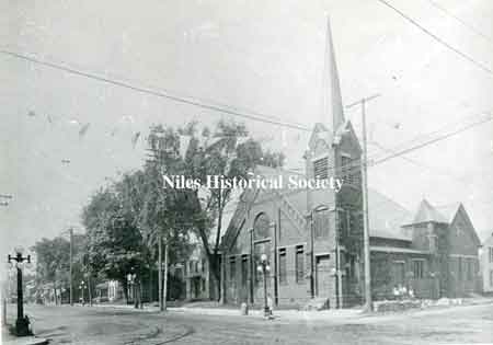 View of the First Presbyterian Church and houses on North Main Street.