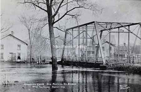 Mosquito Creek bridge over West Federal Street. At the height of the 1913 flood, the water was over the floor of the bridge.