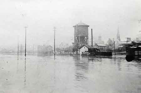 Looking northwest from South Main Street bridge. The steeple of St. Stephen's Church can be seen at the upper right of photo.