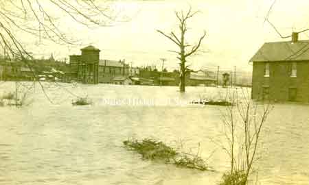 A photo of a view from First Street looking across the river to the north.