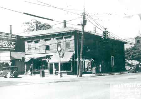 The corner of South Main Street and West Park Avenue showing the newspaper stand