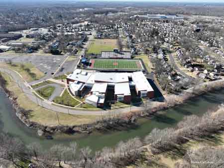Aerial view of Niles McKinley High School complex and Mosquito Creek. 