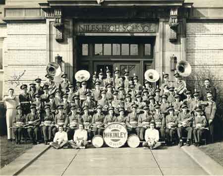 Niles School band 1941 all in uniform. Ruth Fisher, first front row; Mary Whitney, last front row. James Bill Holmes, marked on second row.