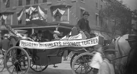President McKinley's first grade teacher in a carriage in front of the Allison Hotel at the intersection of North Main Street and Park Avenue.