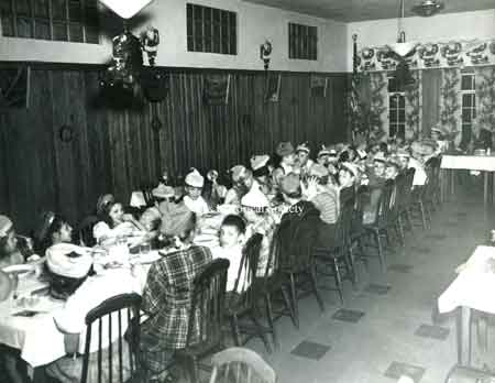 A Christmas party for the campers from the "Fresh Air" camp sponsored by the Niles Kiwanis Club in 1954.