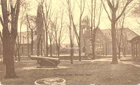 Taken between 1908-1915 this view of the public park shows the Methodist Church on the right, which was dedicated in 1908. On the extreme right is the porch of the Town Hall which was moved when the Memorial was built and the public park became part of the Memorial grounds.