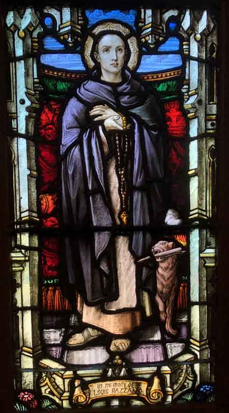 Mt. Carmel Church windows are adorned with stain glass artwork that the families donated.