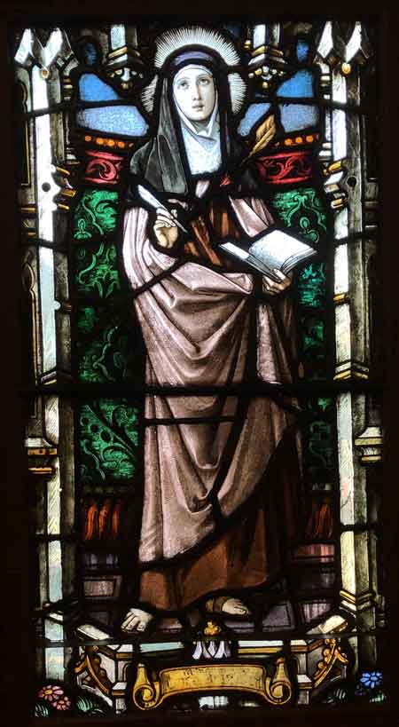 Mt. Carmel Church windows are adorned with stain glass artwork that the families donated.