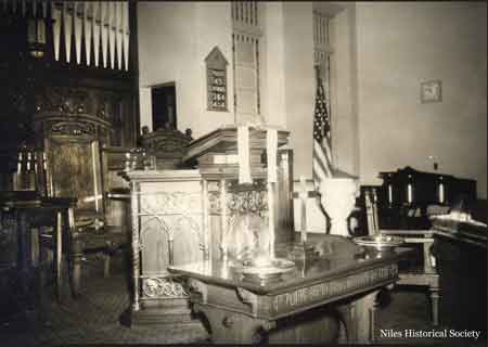 Pulpit furniture donated by Mrs. James Ward.