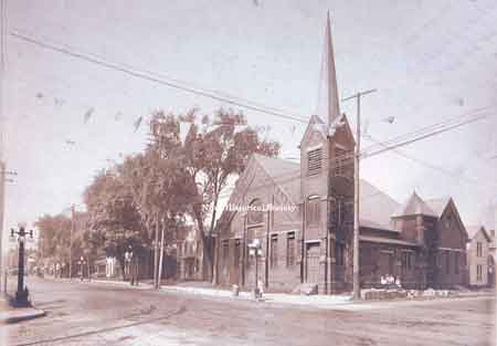 Picture of the west side of North Main Street to West Park Avenue before the construction of the McKinley Memorial. The First Presbyterian Church was built in 1892 and torn down in 1957.