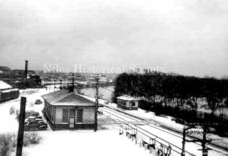 Penn station in the snow, located on the east side of the viaduct with the Mahoning River on the right side.