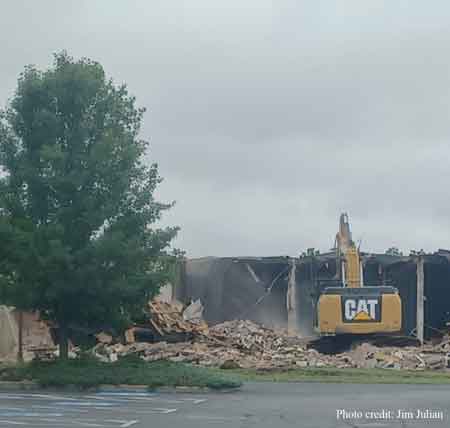 A series of photographs of the Waddell Pool bath house as it is demolished on September 6, 2022.