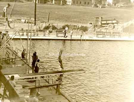 The pool was dedicated Wednesday July 25,1934. The newspaper stated,” to several thousand swimming enthusiasts of the city, today marks a noted change from an unsanitary dirtied water creek swimming hole to the most modern and up-to-date pool.” 