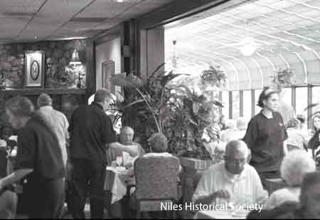 There are four dining areas on the main floor. a bar area, and a banquet room in the lower level. An extensive wine selection is available.