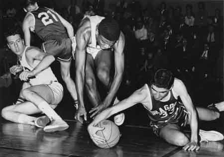 Don Andres, No. 33, fights for basketball.