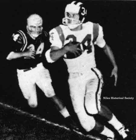 Bo Rein eluding a tackler.