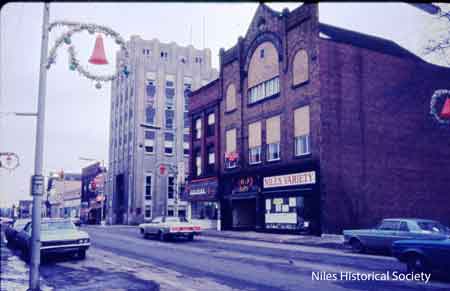 Photo taken of the Swaney or Calvin Building on left, IOOF Lodge Building on right on the Northwest corner of Park Avenue and Main Street, Niles, Ohio. Photo taken November 1988.