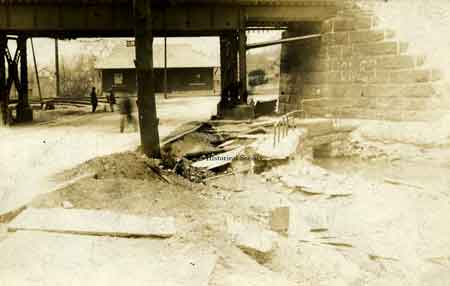 The old Erie Railroad bridge passing over Church Street where it connects to Robbins Avenue.