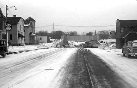 Same view in 1954 winter as the North Main Street underpass work is progressing.