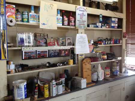 View of shelf with various items.