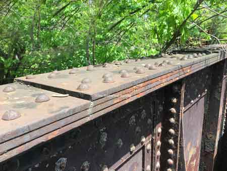 Top of bridge showing laminated beam.