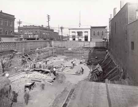 The construction of the mini-skyscraper by the Niles Trust Company on the site of the former Harris residence began on November 25, 1929 and was completed in 1930.