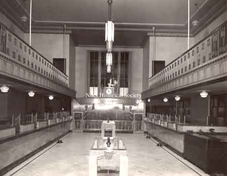 The bank was completed in the Art-Deco style popular in the 1920's and 1930's. Heavy use of deep colored marble and shining bronze is evident throughout the building.
