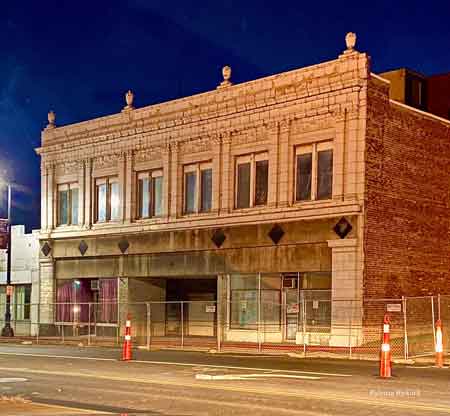 In late October 2023 the two corner buildings, Reisman's and the Robins Theater, were cordoned off prior to their demolition.