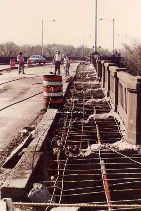 1981 picture of the renovation of the Main Street Viaduct. The sidewalks were removed and repairs were made to the substructure, then new concrete was poured.