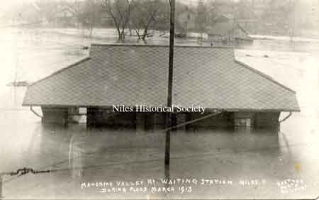 The Streetcar Waiting Station on Robbins Avenue during the 1913 flood.