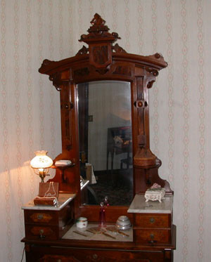 Sample piece of 19th Century bedroom set on the second floor of the Ward-Thomas Museum